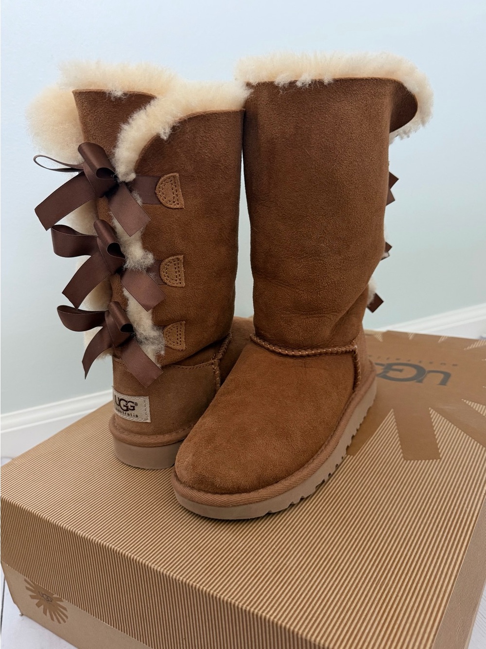 UGG Classic Tall Bow Bailey Bow Boots in Chestnut